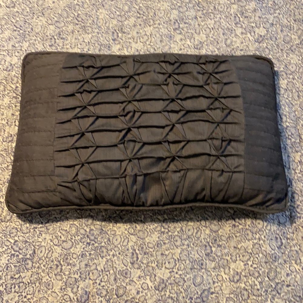 Decorative dark grey throw pillow. Two available.